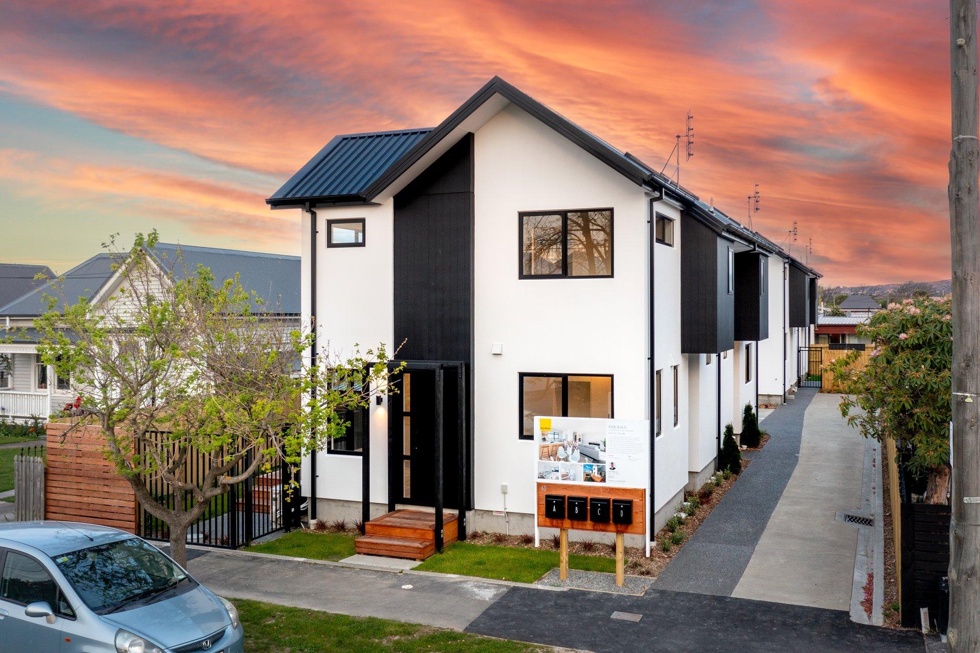 Minimalist white home exterior in scenic landscape